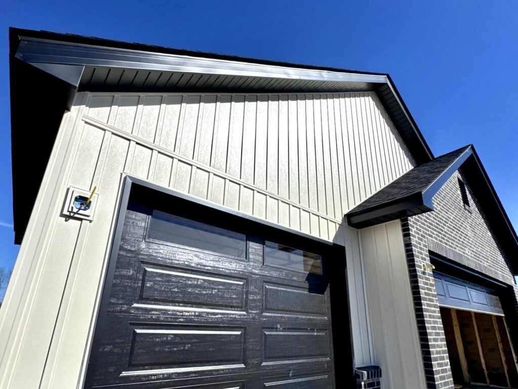 board and batten siding garage elevation new construction home Waterloo IL