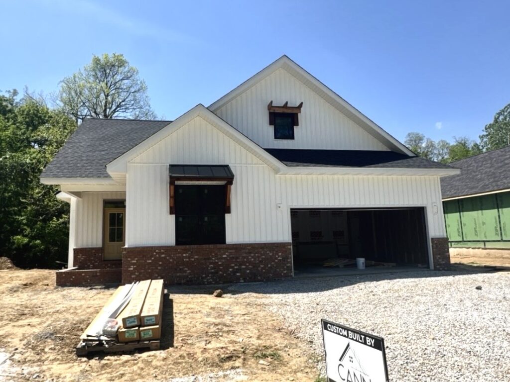 White board and batten siding installed on a new construction home in Caseyville IL