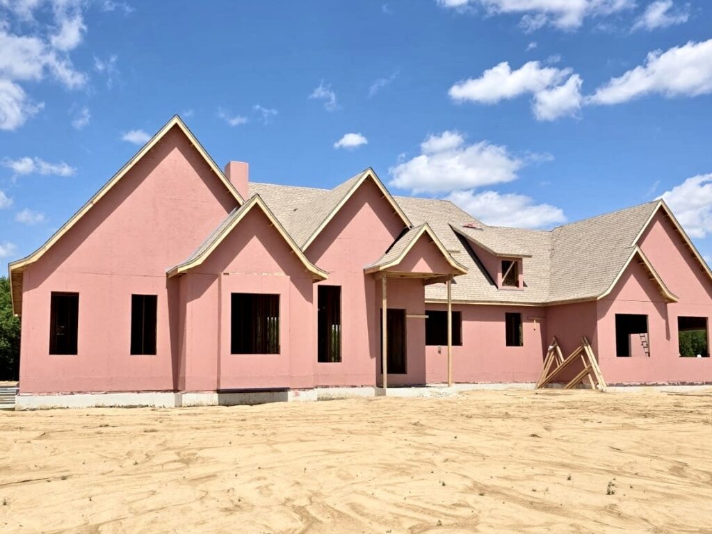 Large custom home during new construction roof installation in Freeburg IL
