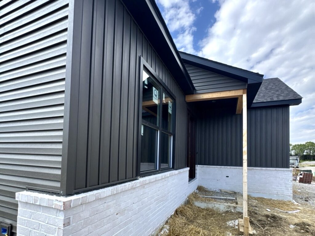 Modern vertical siding installation by Barringer Brothers Roofing on a new construction home in O’Fallon IL