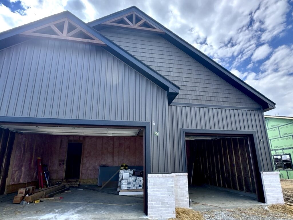 Dark vinyl siding installed on a new construction home in O'Fallon IL