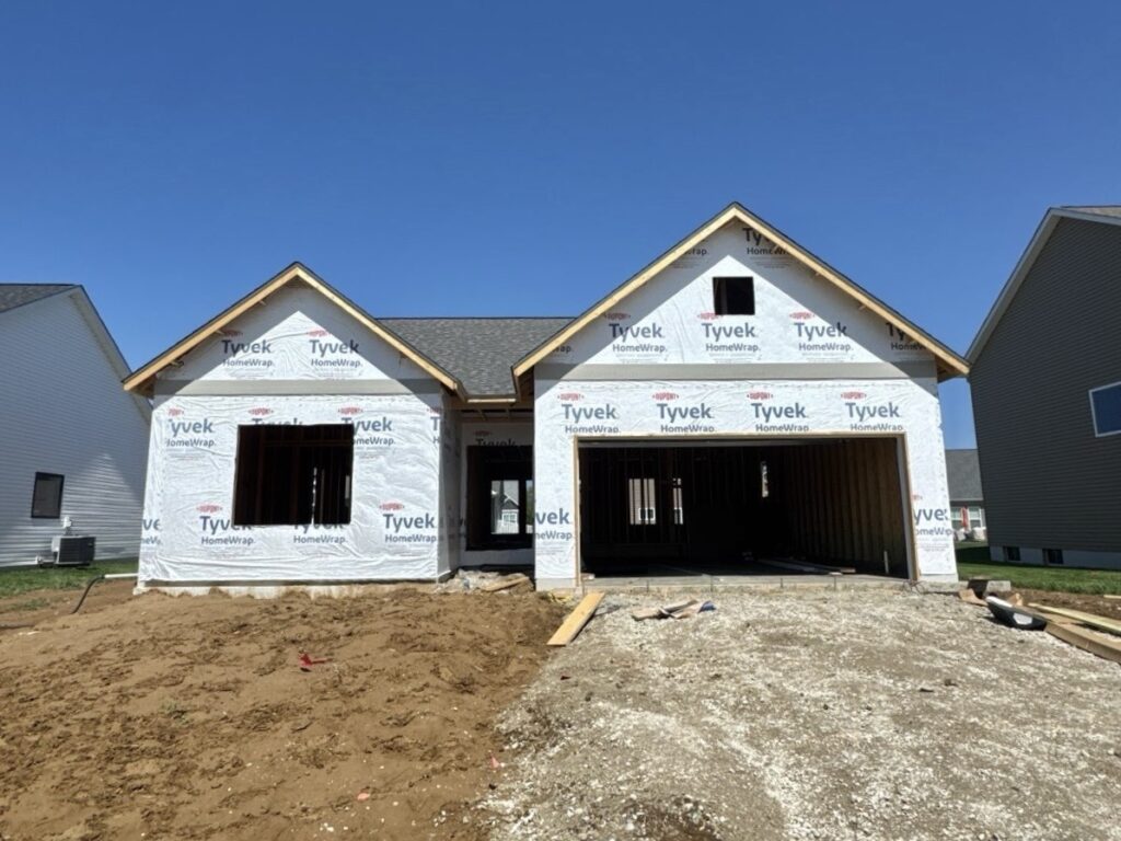 New construction home in Shiloh IL with weather barrier and home wrap installed before exterior work