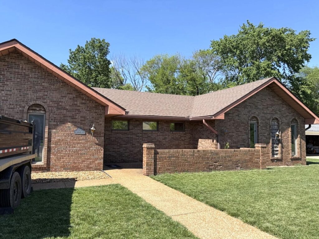 Architectural shingle roof replacement completed on a brick home in O'Fallon, Illinois by Barringer Brothers Roofing.