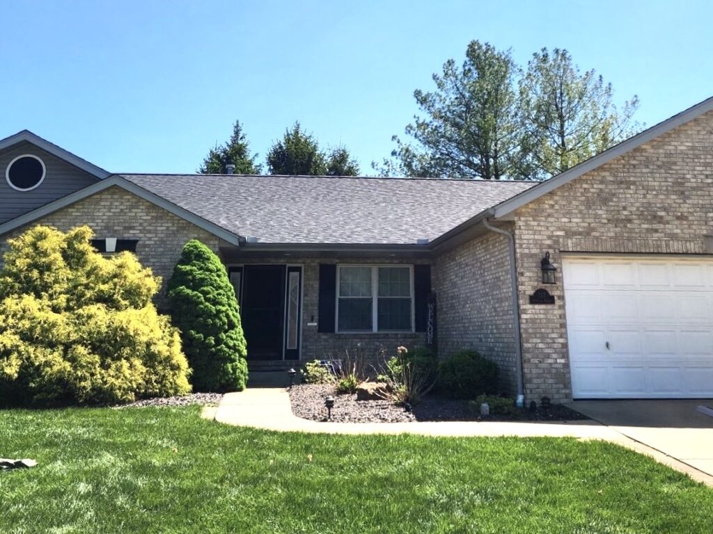 Architectural shingle roof replacement on a brick home in O'Fallon, Illinois completed by Barringer Brothers Roofing.