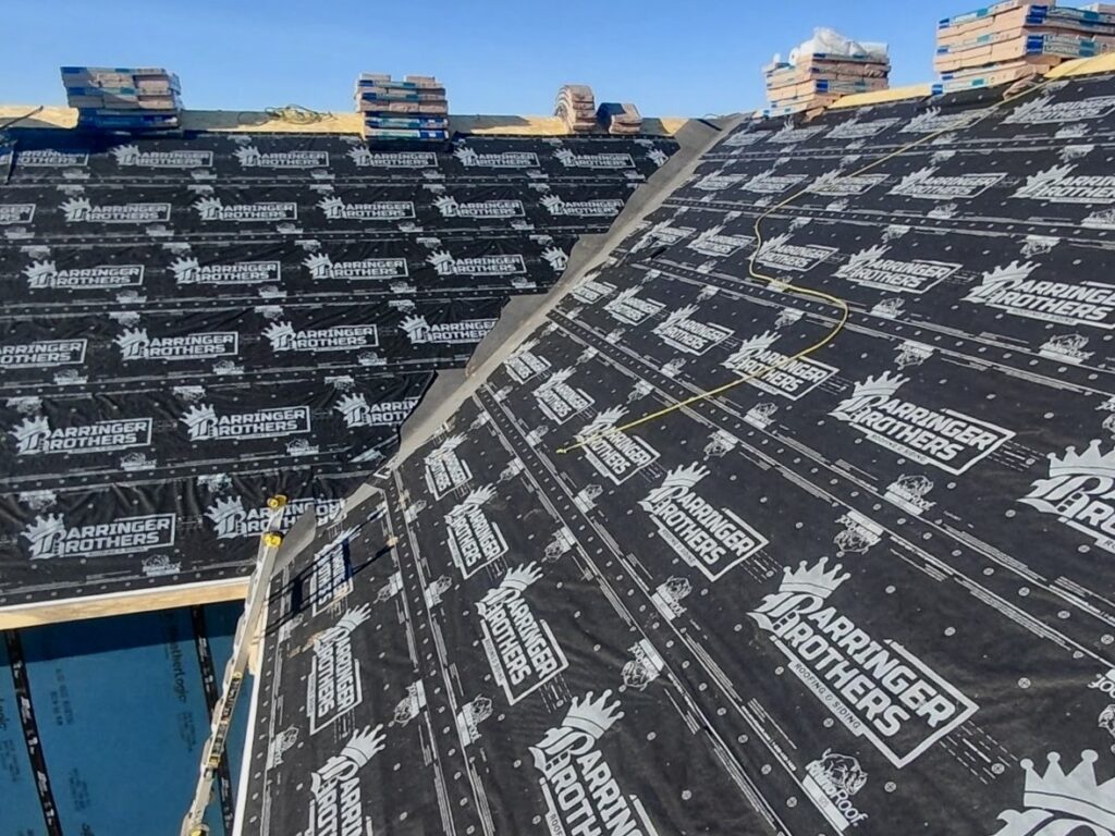 Synthetic roofing underlayment installed on a new roof in O'Fallon, IL by Barringer Brothers Roofing.