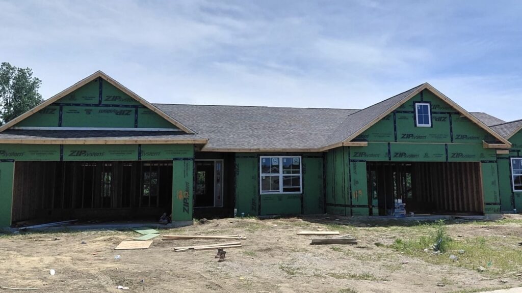 New asphalt shingle roof installation on a home under construction in Fairview Heights, IL by Barringer Brothers Roofing.