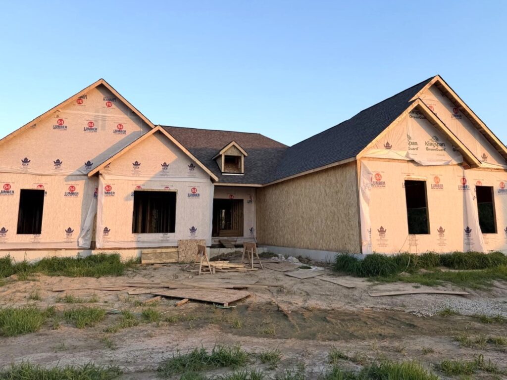 New construction asphalt shingle roof installed by Barringer Brothers Roofing on a home in Highland, IL.