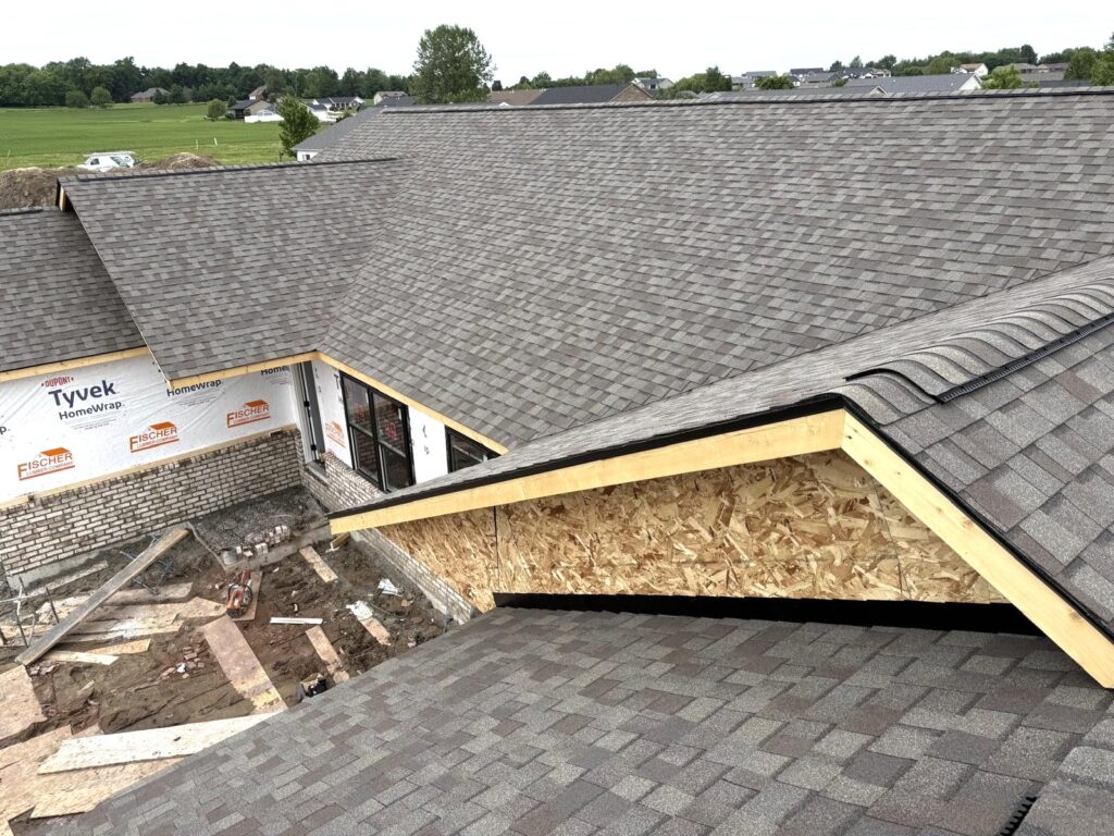 New construction asphalt roof installation by Barringer Brothers Roofing on a home in Highland, IL.