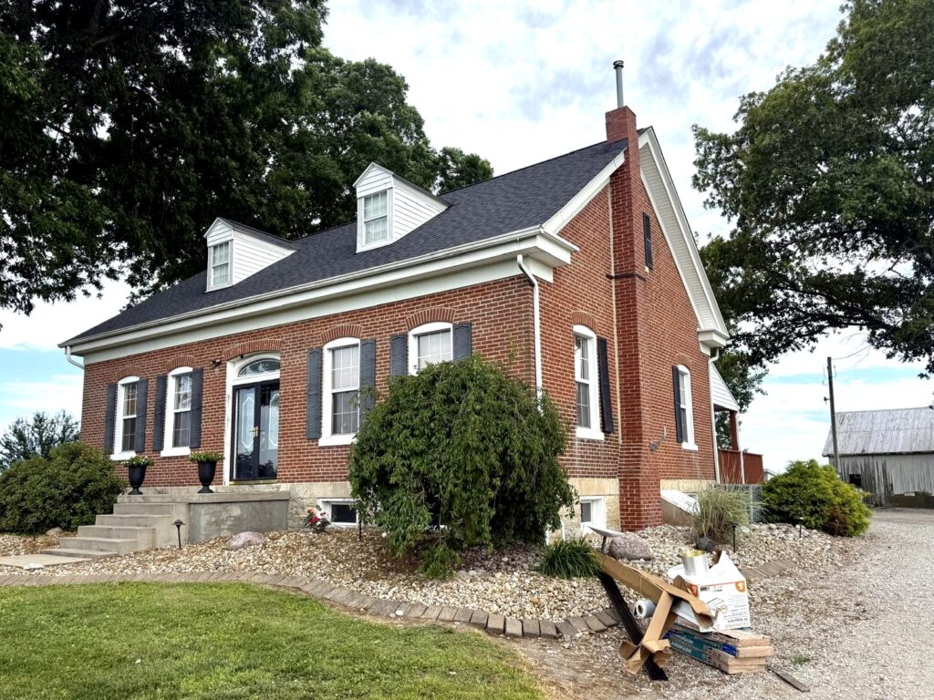 New architectural shingle roof on older brick home in Trenton IL by Barringer Brothers Roofing