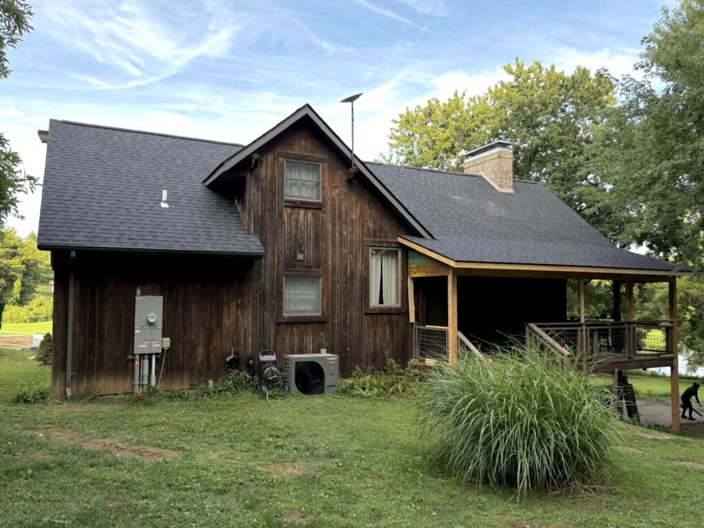 Asphalt roof replacement on a home in Columbia, IL by Barringer Brothers Roofing.