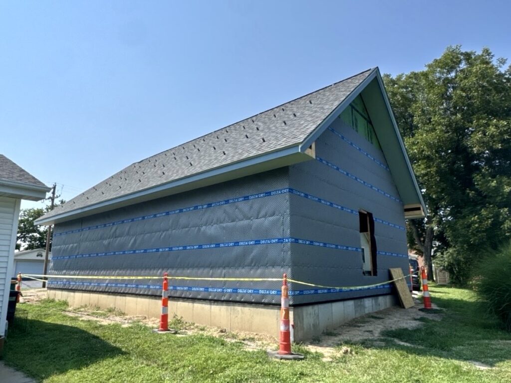 Quality asphalt roof installation on a new home in Columbia, IL by Barringer Brothers Roofing.