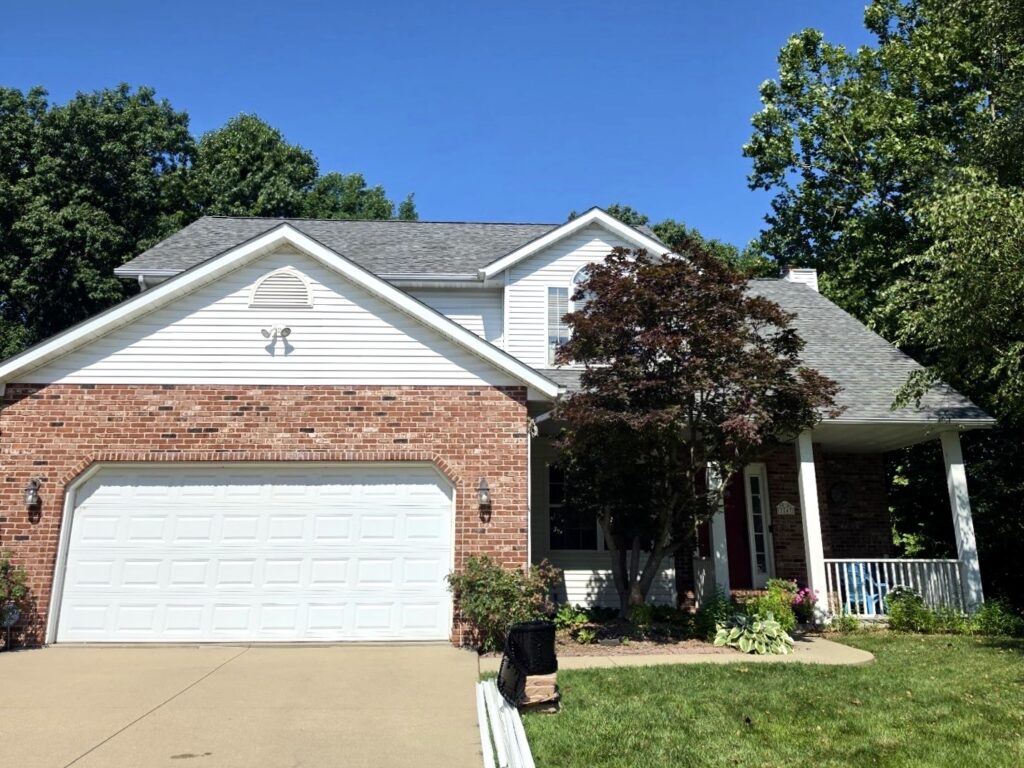 New architectural asphalt roof replacement completed on a home in Belleville, IL by Barringer Brothers Roofing.