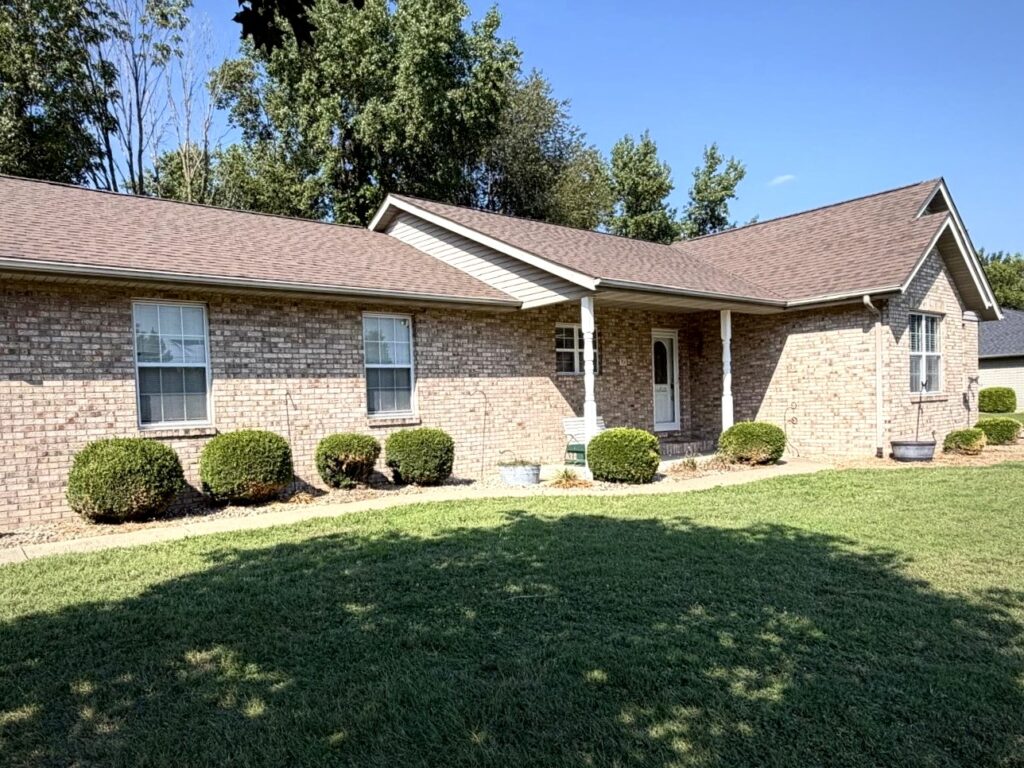 Completed asphalt shingle roof replacement on a Southern Illinois home by Barringer Brothers Roofing.