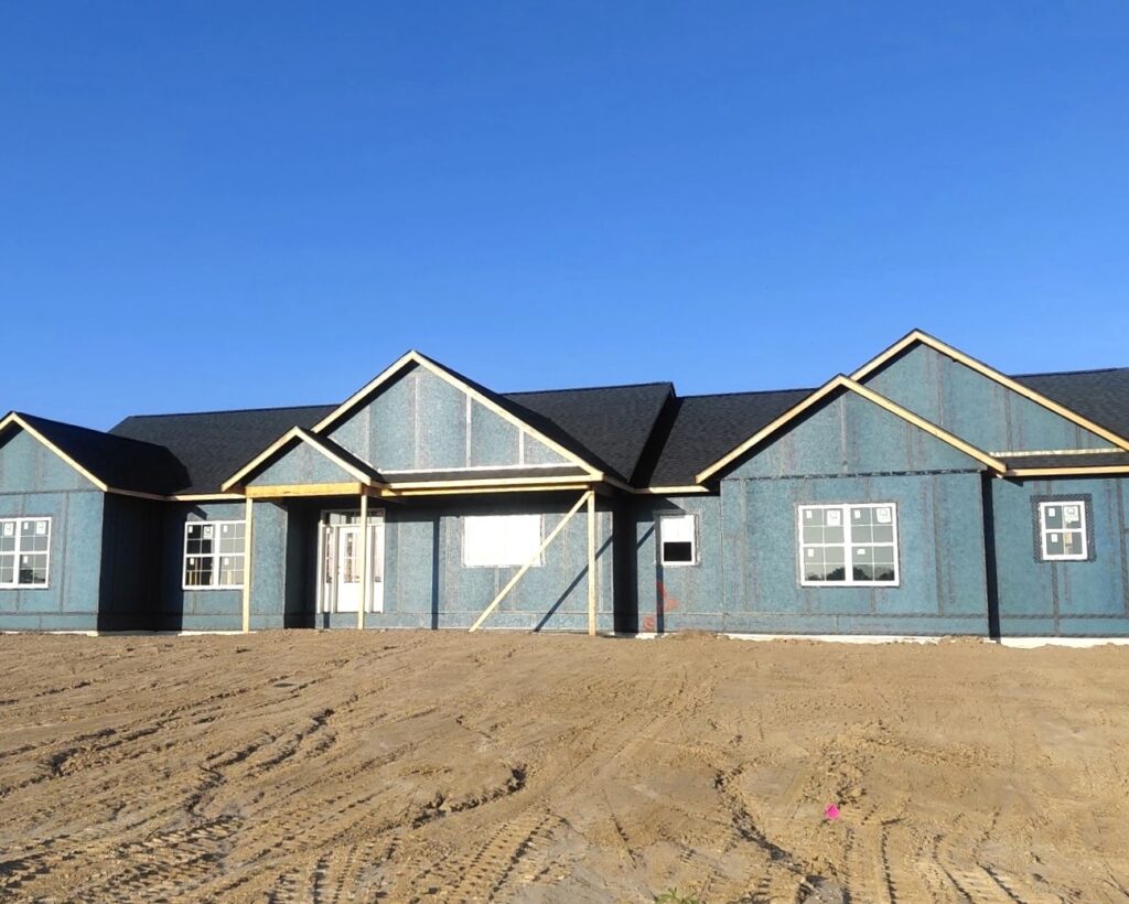 New asphalt shingle roof installed on a home under construction in Southern Illinois.