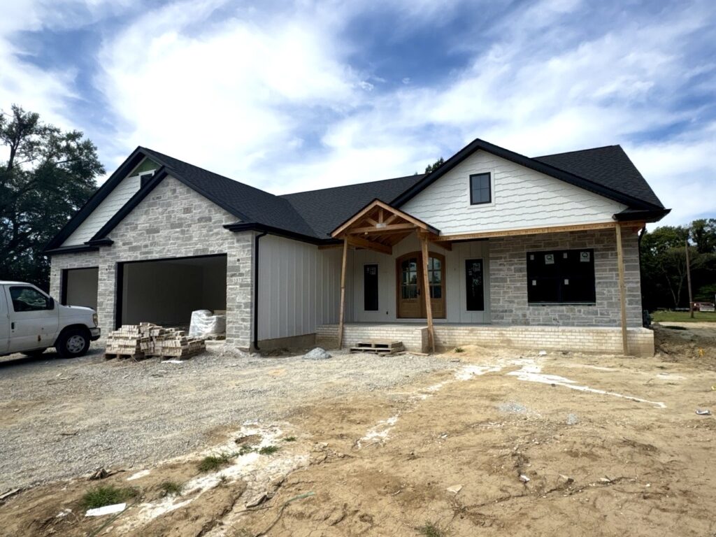 New siding installation on a home in Collinsville, IL by Barringer Brothers Roofing.