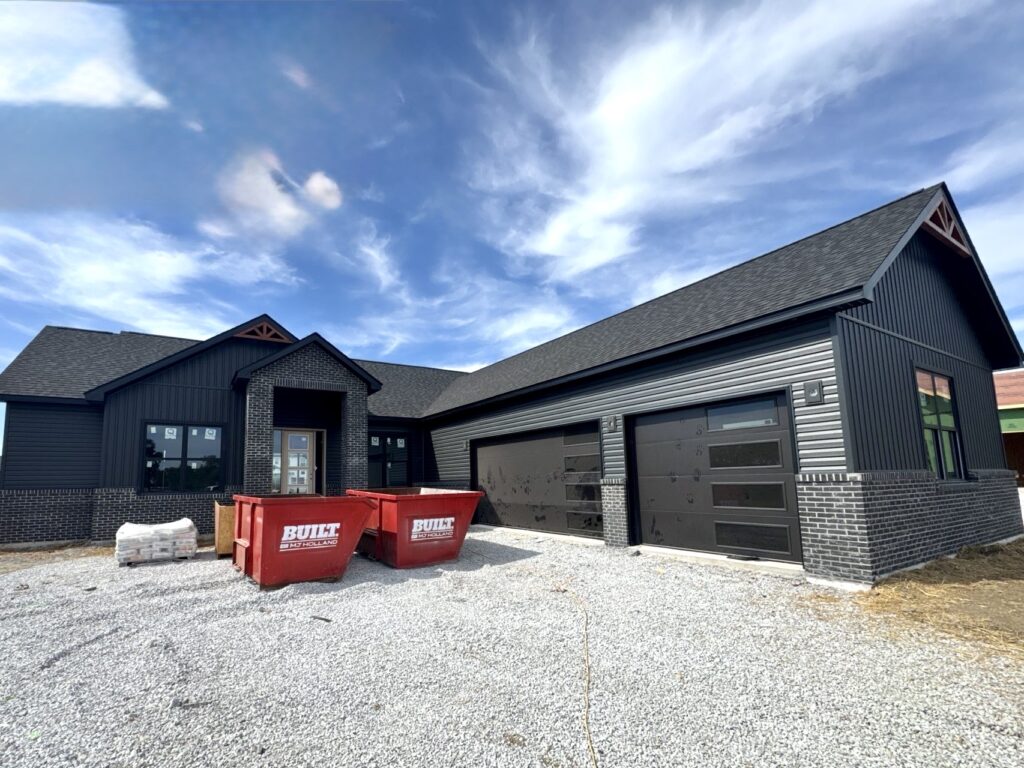 New construction home with roofing and siding installed in O’Fallon, IL by Barringer Brothers Roofing.