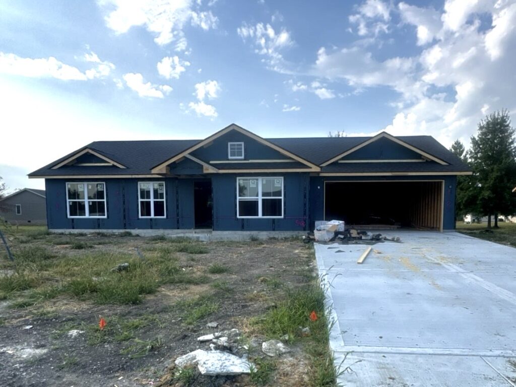 New construction asphalt shingle roof on a home being built in Troy, IL by Barringer Brothers Roofing.